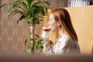 Guest enjoying coffee in The Lounge